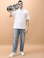 Fit Highly Distressed Light Fade Jeans